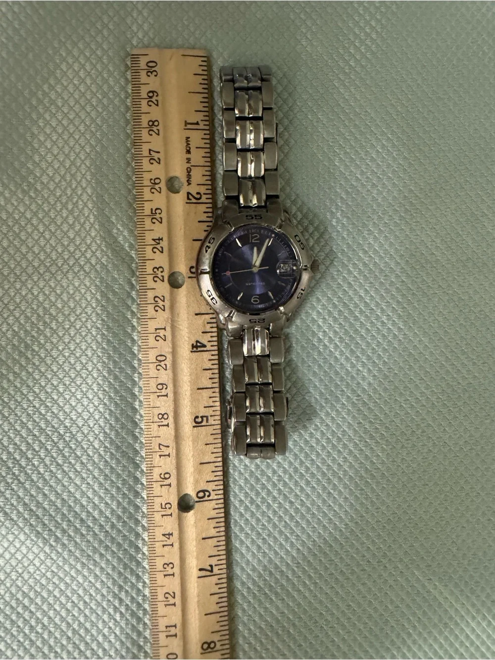 Guess wristwatch featuring